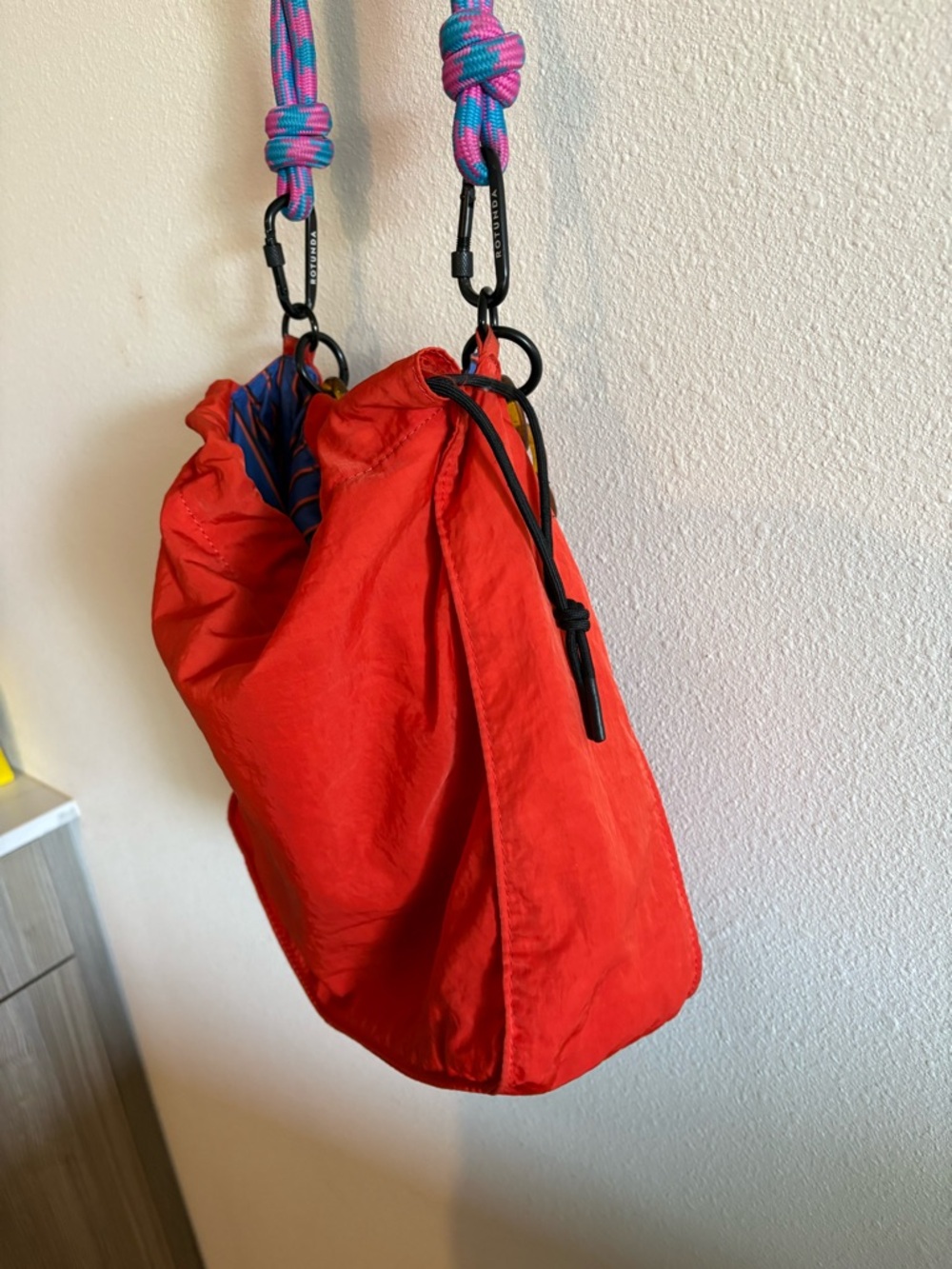 Red Drawstring Shoulder Bag with Tortoiseshell Chain and Colorful Strap - Picture 15 of 15